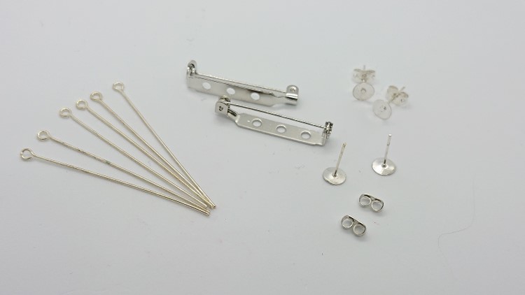 Attach findings to polymer clay